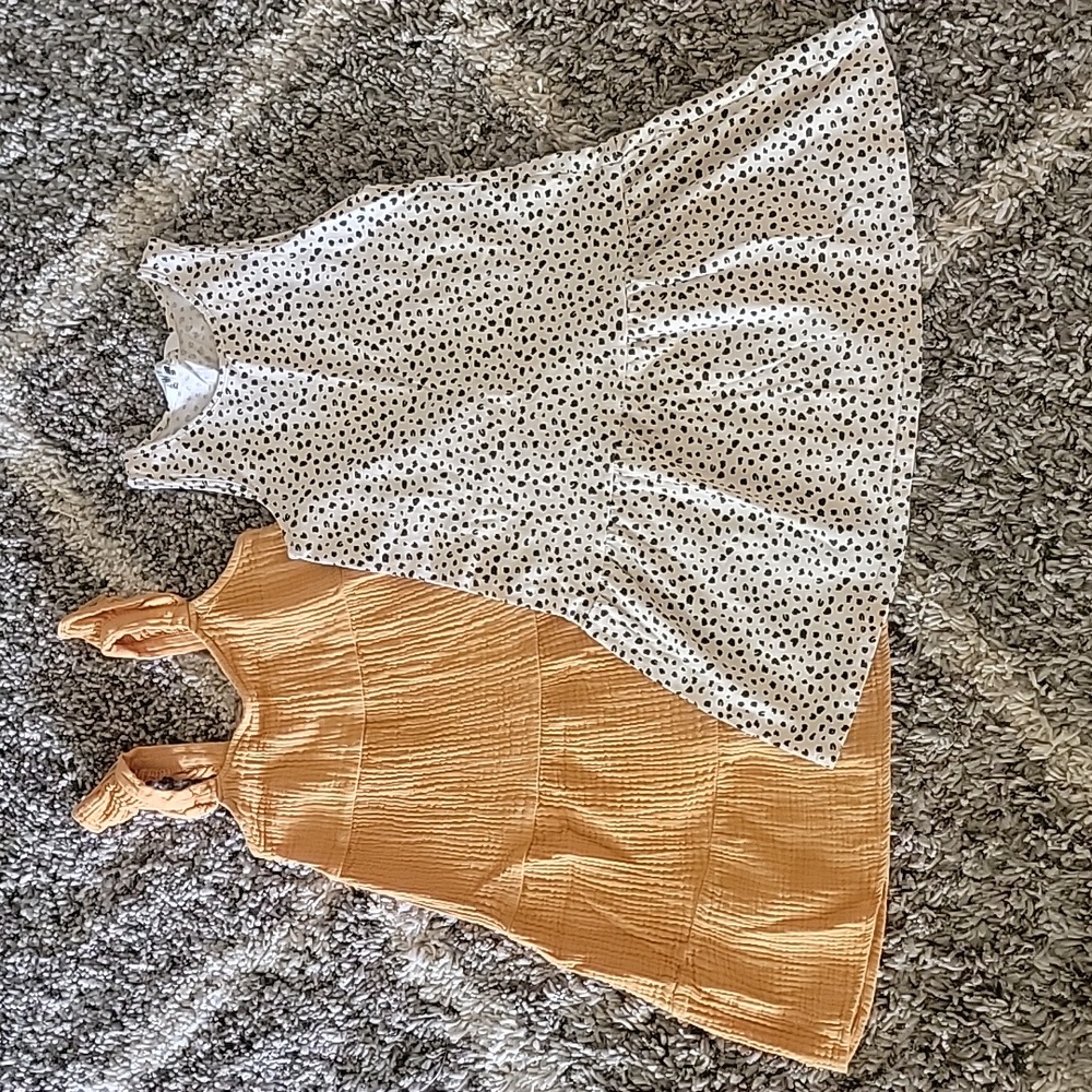 Listing is for both girls summer dresses
